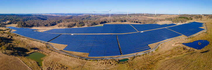 Wall Mural - panoramic low aerial view of the hybrid gullen solar farm and gullen range wind farm for renewable c