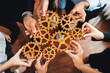 Group of multiracial business people joining gear wheels together as effective unity and productive teamwork concept. Efficient system business team process for solution solving. Meticulous
