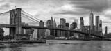 Fototapeta  - Brooklyn Bridge with Manhattan skyline in the background  in black and white