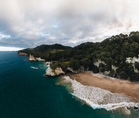 Aerial of Te Whanganui-A-Hei Cathedral Cove Marine Reserve in Coromandel Peninsula North Island, New Zealand. Drone shot bird's eye view.