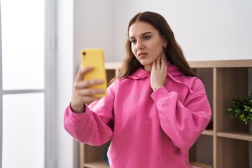 Poster - Young woman having telemedicine at home