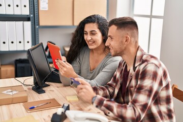 Poster - Man and woman ecommerce bussines workers using touchpad and credit card at office