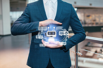 Aufkleber - Cropped of businessman holding Chatbot virtual icon, collage