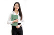 © NAMPIX - Portrait of young asian woman, company worker smiling and holding file folder, standing over white background