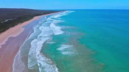 Wall Mural - Guvvos beach long sand strip and sea waves on Great Ocean Road route Australia