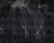 black grunge background with space for text or image.