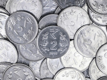 Closeup Of A Collection Of Indian 2 ( Two ) Rupee Coins Made Of Silver In A Mixed Up Pile 