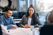 © Valerii Apetroaiei - Successful hipster team in coworking. Freelancers.