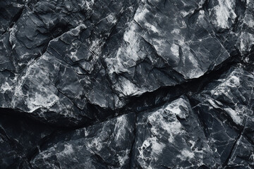 Poster - Close-up view of a dark stone texture resembling granite mountain surfaces