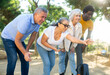 © JackF - Cheerful males and females playing petanque in the park on holidays