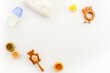 Baby accessories with feeding baby bottle and toys. Childcare concept