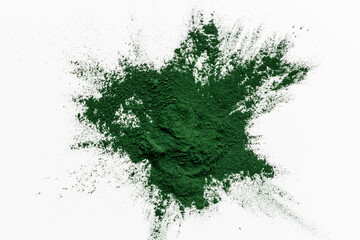 Wall Mural - Spirulina algae powder splash on white background, top view