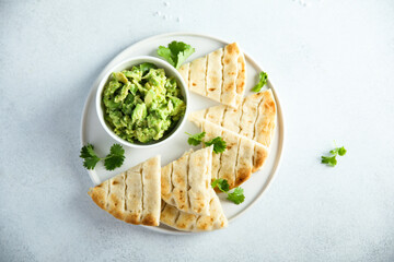 Wall Mural - Mashed avocado with fresh flatbread