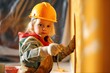 © Road Red Runner - dorned in worker's clothing and a protective hard hat, a little girl fearlessly contributes to a construction site.