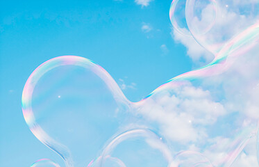 Poster - Abstract 3d art with holographic soap bubbles floating on sky background. fluid. liquid blobs. 
