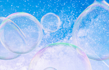 Poster - Abstract 3d art with holographic soap bubbles floating on sky background. fluid. liquid blobs. 