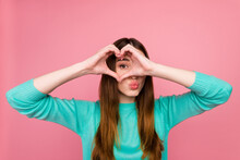 Portrait Of Attractive Lovely Cheery Girl Showing Heart Sign On Eye Isolated On Pastel Color Background