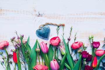 Wall Mural - Beautiful bouquet of spring flowers with heart  - Happy Birthday, Mothers day greeting card