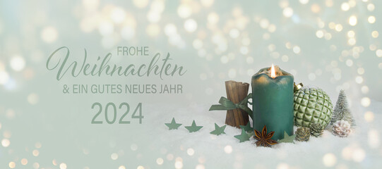 Wall Mural - Christmas greeting card with German text Frohe Weihnachten und ein gutes neues Jahr 2024 - xmas candle in the snow