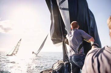 Wall Mural - Man sailing on sunny ocean