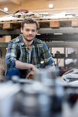 Poster - Portrait confident mechanic in auto repair shop