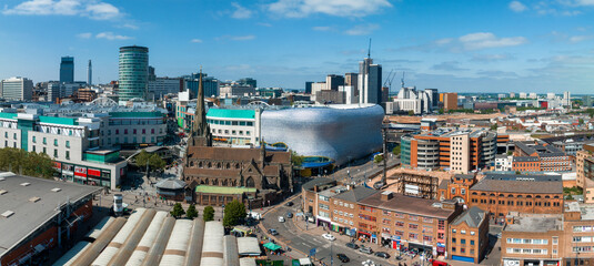 View of the skyline of Birmingham, UK including The church of St Martin, the Bullring shopping centre and the outdoor market.