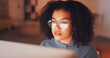 © Azee/peopleimages.com - Reflection, black woman and employee with glasses, night and online reading in workplace, deadline or schedule. African American female entrepreneur, consultant or journalist with eyewear and reflect