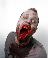 Wall Mural - Bloody Screaming male Zombie 