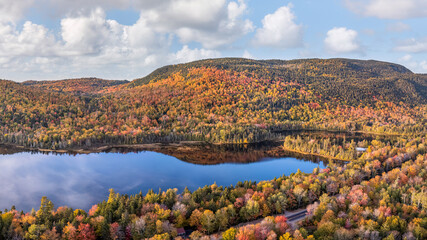 Wall Mural - Maine  - New England fall foliage at a lake with sunset autumn colors 