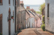 Charming and quaint old town lane and colourful harling cottages in the medieval village of Culross, a popular filming location in Fife, Scotland, UK.
