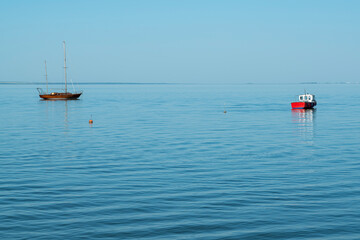 Wall Mural - yachts on the water against the blue sky