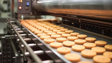 Production Line Of Baking Cookies. Biscuits On Conveyor Belt In Confectionery Factory. Production Line At The Bakery. Food Industry.