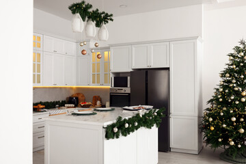 Sticker - Cozy spacious kitchen decorated for Christmas. Interior design