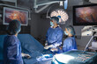 © Graphicroyalty - The surgeon's holing the instrument in abdomen of patient. The surgeon's doing laparoscopic surgery in the operating room. Minimally invasive surgery.