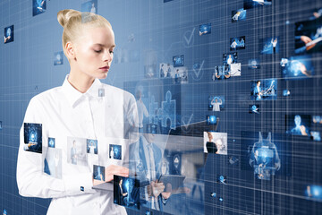 Canvas Print - Attractive blonde european woman using laptop with connecting businesspeople, technology, metaverse and video conference concept. Creative images connected on blurry blue background.