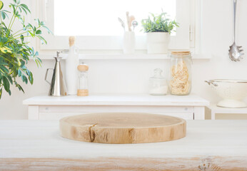 Wooden stand on table in kitchen interior and free space