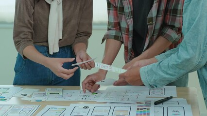 Team of Creative Web, Graphic Designer planning, drawing website ux ui app for mobile phone application and development template layout, process to developing prototype wireframe.
