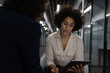 © ReeldealHD images - Businesswoman in a meeting with a coworker working late in the office