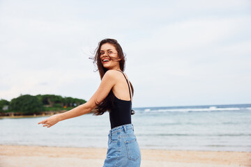 woman young running happiness lifestyle sunset sea summer travel beach smile