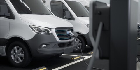 Fleet of generic electric EV delivery vans charging on charging stations