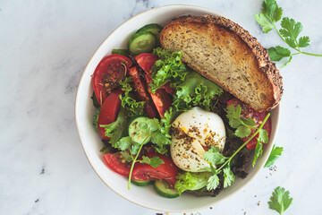 Wall Mural - Vegetable salad with egg and whole grain toast for breakfast, white background.