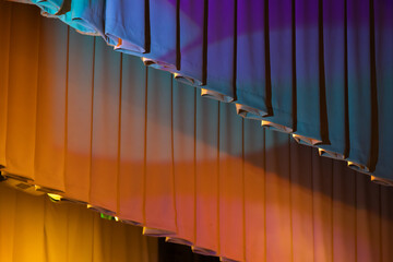 Curtains with colorful stage illumination, background photo