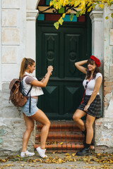 Canvas Print - Female Friends Enjoying Togetherness on Historical Town´s Streets