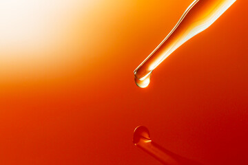 Wall Mural - macro science experiment pipette surface,top view macro shot of chemical dropper injects oil into cl