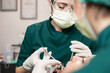 Dental surgery. Team dental surgeons working in dental office