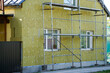 Thermal insulation of the facade of the residential house with thick rock mineral wool plates