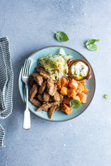 Wall Mural - Cooked meat with vegetables and spices