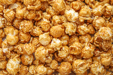 Wall Mural - Tasty caramel popcorn as background