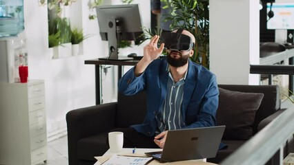 AI developer working with vr glasses to create new 3d script for small business development, coworking space. Businessperson using virtual reality headset, artificial intelligence. Tripod shot.