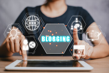 Wall Mural - blogging concept, person using digital tablet on office desk with blogging icon on virtual screen.
